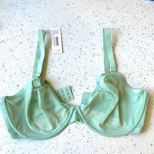Size 38G Cuup brand bra. Sheer material with underwire. Adjustable straps.